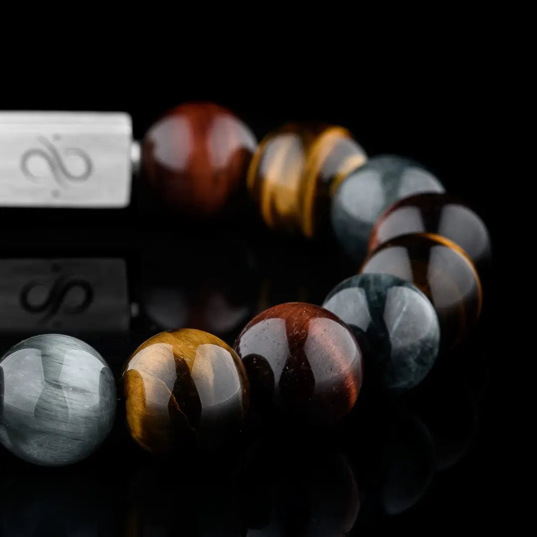 Detail of tiger eye bracelet for men. 12mm round Classic design showing chatoyancy. Aurum Brothers.