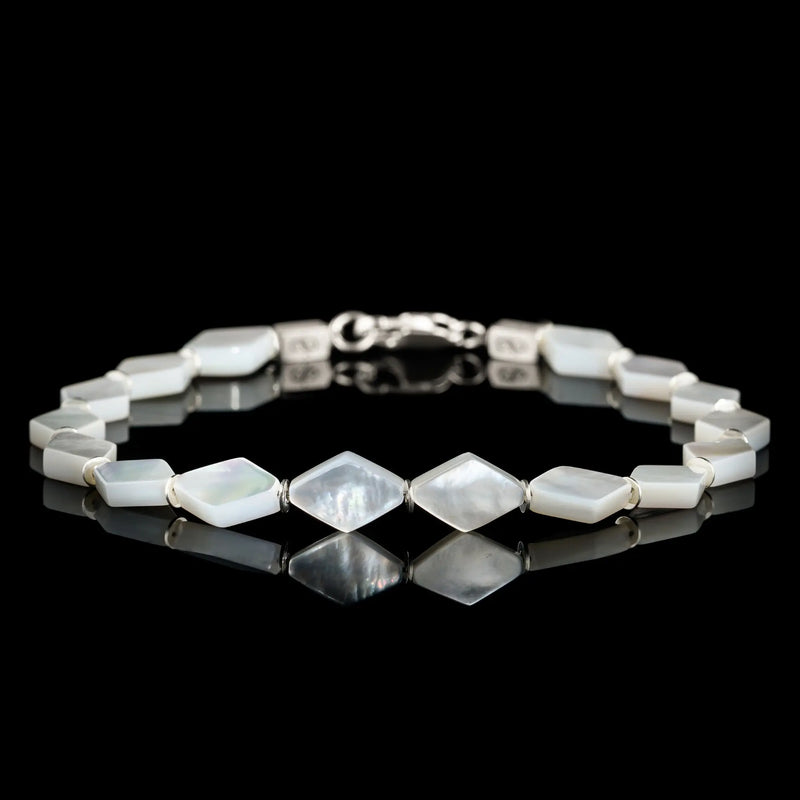 Silver lip oyster bracelet for men. 10x7mm shell tiles. Aurum Brothers.